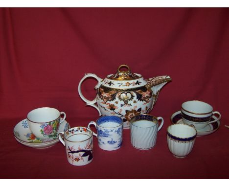 An early 19th Century Derby Teapot decorated with Japanese flowers (a/f), an early 19th Century Spode blue and white coffee c