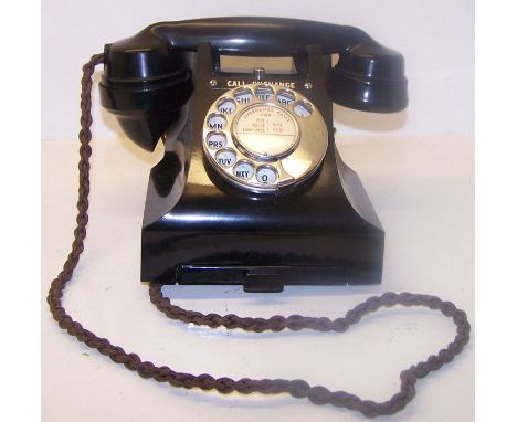 A 1950's black Bakelite Telephone marked "332, GPO" with 'call exchange' button and address drawer, converted for modern conn