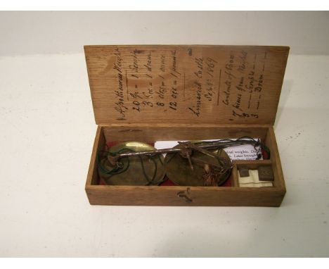 A set of 19th Century Apothecaries Scales with brass pans and original weights, drams and scruples, from Limerick Castle and 