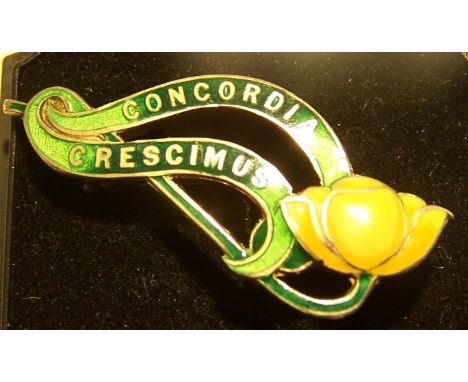A silver and enamel Buttercup Brooch, Birmingham, 1919, by William Hare Haseler, co-founder of Liberty & Co.
