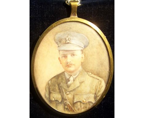 A Miniature oval half length Portrait of a WWI Army Officer in uniform in a brass frame.  2 1/2" (6.5cms) x 2" (5cms).