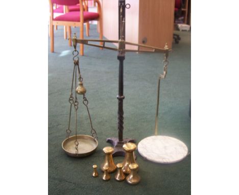 A set of Avery brass and wrought iron Balance Scales with marble plate (cracked) together with six Avery brass Weights - 4oz 