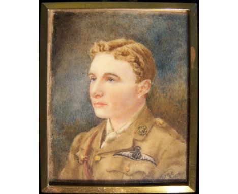 W G E; a half length Miniature Portrait of a WWI Pilot, mounted on ivory and wearing the wings of the RFC, signed with initia