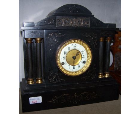 A Victorian Mantel Clock with ivorine dial in architectural style black marble case.  13" (33cms) high.