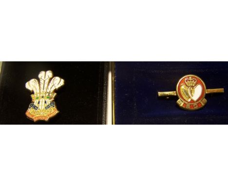 A silver gilt and enamel Brooch with Prince of Wales Feathers, and one other silver gilt and enamel brooch.