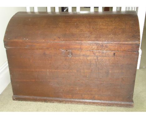 A 19th century oak dome top Trunk with side carrying handles, 3' (92cms) wide.