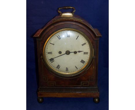 A Regency Bracket Clock with white dial, engraved brass back plate and bell strike, in domed mahogany case with brass inlaid 