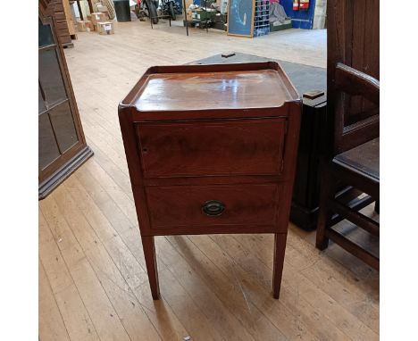 A mahogany tray top commode