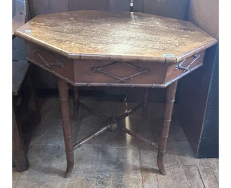 An unusual early 20th century, pine and bamboo octagonal centre table, 88 cm wide