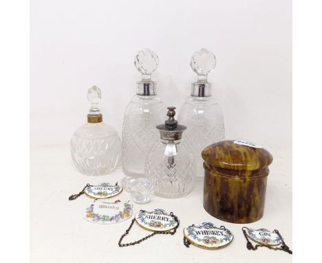 A pair of glass perfume bottles, with silver mounts, assorted other perfume bottles, and assorted ceramic spirit labels (box)