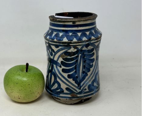 A 17th century Spanish blue and white albarello, 17 cm high