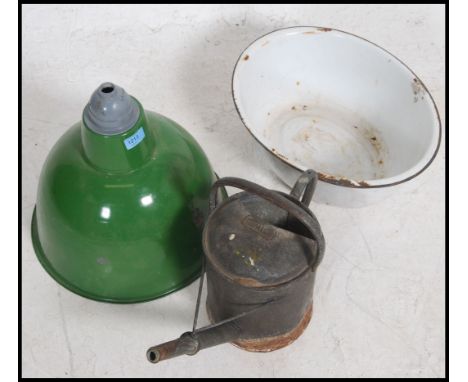 A vintage industrial mid 20th century enamel pendant light shade along with  a enamel bowl and galvanised watering can. Measu