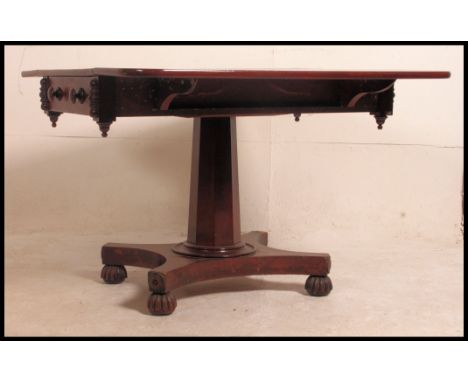 A 19th century Victorian flame mahogany drop leaf sofa table, the rectangular top above two end frieze drawers, on tapered he