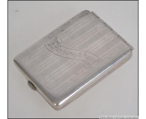 A vintage early 20th century Schweppes advertising silver plated match book holder. With a engine turned front with Schweppes