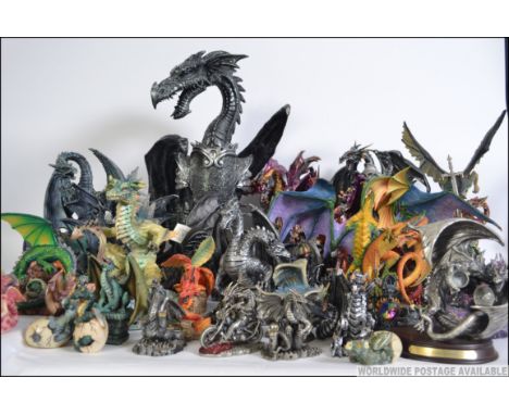 A large collection of Gothic / medieval dragon figurines to include large dragon sculpture, various collectors pieces such as