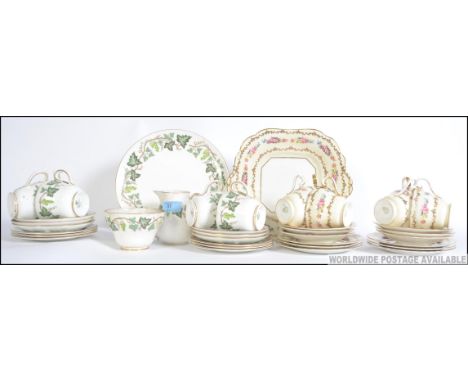 A 20th century Aynsley ceramic part tea service together with a Wedgwood Santa Clara pattern part tea service