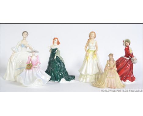 A group of ceramic figurines to include Royal Doulton Kays Kelly HN3222 and Anita HN3765 a Compton and Woodhouse Winter figur