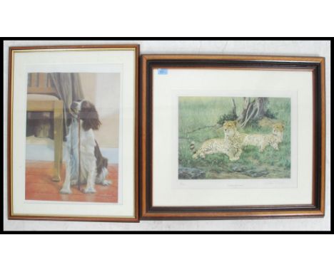 A framed and glazed limited edition signed print of two leopards entitled ' A Distant Movement ' signed in pencil by the arti