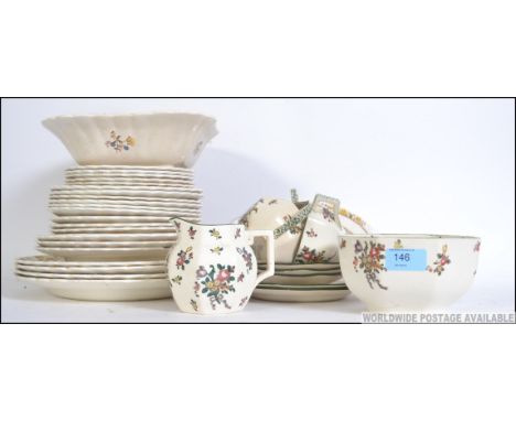 A Copeland Spode ' Butteryfly ' patter part dinner service together with a Royal Doulton ' Old Leeds Spray ' part tea service