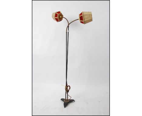 A mid century floorstanding anglepoise - goose neck twin standard lamp. The angled terraced base with twin stems having goose