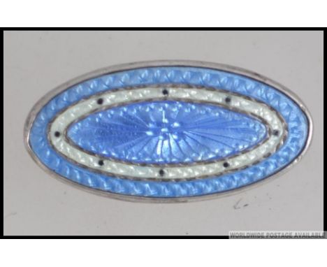 A believed Scandinavian sterling silver  and enamel set lozenge brooch being stamped to verso with makers mark. Total weight 