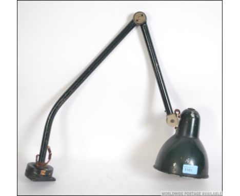 A good mid century Industrial French anglepoise factory work / desk lamp having wall bracket fitment, original paintwork with