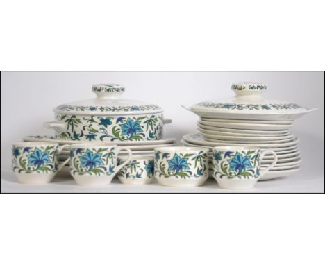 A retro mid century part service of Midwinter ' Spanish Garden ' to include dinner plates, side plates, cups etc