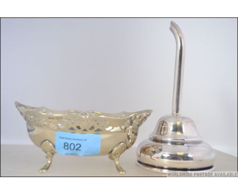 A Masonic silver plate bon bon dish with etched compass and rule Mason's motif together with a silver plated wine funnel. Dis