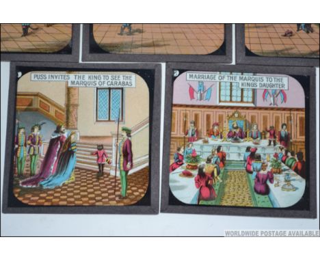 A complete set of eight glass coloured magic lantern slides for Puss In Boots from the Junior Lectures series.