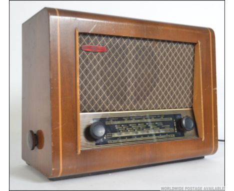 A vintage oak cased PYE valve radio. Model NO. 096022