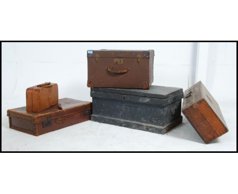 A collection of trunks, chests and suitcases to include a wooden tool chest with contents, wooden hinged box, square canvas s