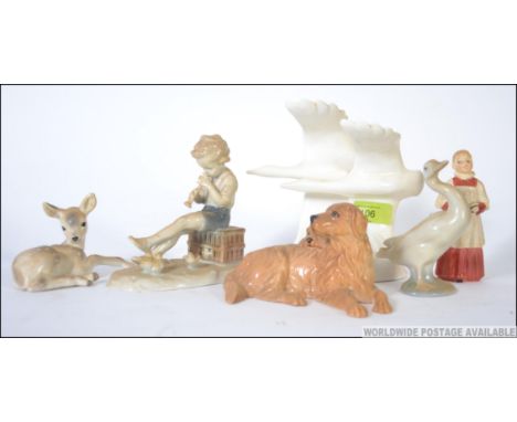 A collection of ceramics to include Royal Doulton Going Home HN3527, Royal Doulton Choir Boy HN3141, Lladro duck, West German