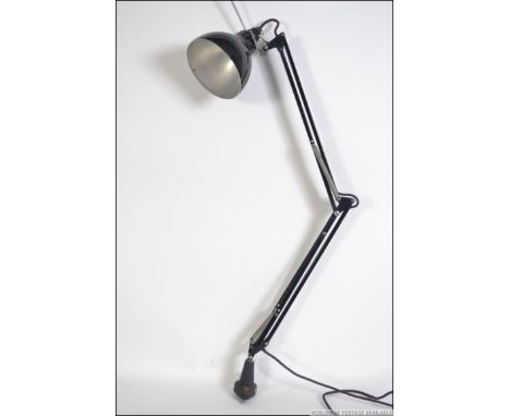 A retro mid 20th century engineers / draughtsman wall mounted desk mounted Herbert Terry anglepoise lamp having an over sized
