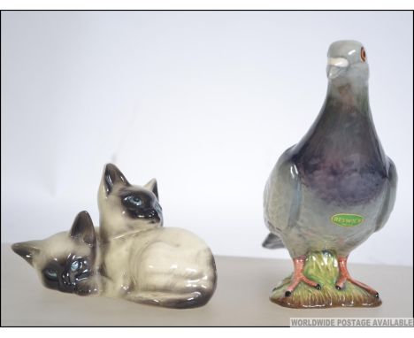 A fantastic vintage Beswick ceramic study of a grey  pigeon with two bars to the wings impressed  to the base Beswick 1383 al