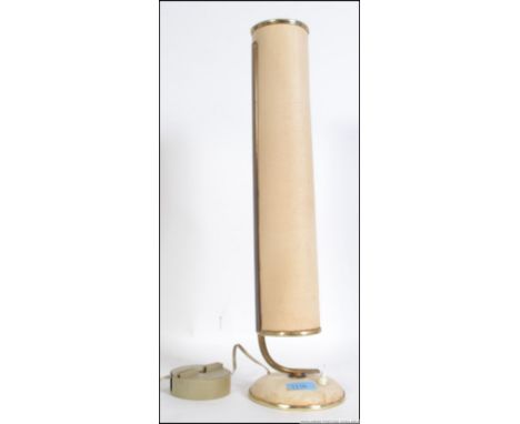 A vintage retro Swedish double bulb bedside / table lamp. Set on a circular base with a tall slim cylinder shade.