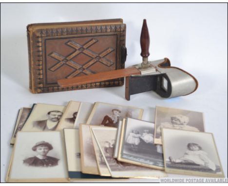 A vintage stereo card viewer along with a Victorian Carte de Viste album and 26 good cabinet cards depicting mostly women and