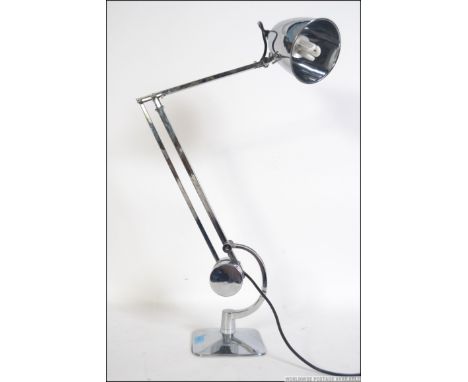 A contemporary 20th century Horstman style counter balance anglepoise desk lamp with a chrome finish. Having a square base wi
