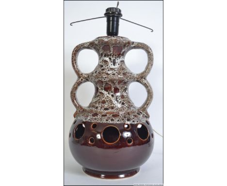 A 1970's retro German Fat Lava tall lamp - light. Comes complete with integral light to base and the shade light. Measures 50