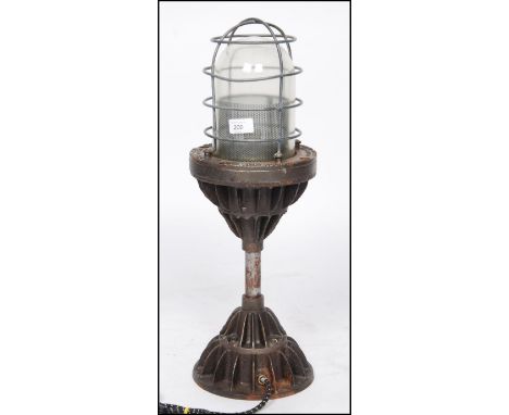 A stunning large desk mounted Industrial bulkhead table - desk lamp. The heavy base with large caged pendant shade atop of pr