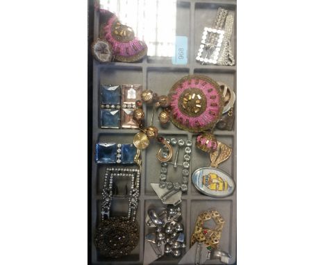 A stunning collection of vintage and antique costume jewellery to include brooches, belt buckles, hair slides etc please see 