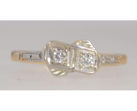 An 18ct gold, platinum and diamond vintage ladies ring. The stones approx 10pnts. Size K.5 / Weight 2.5g Marked 18ct, test 18