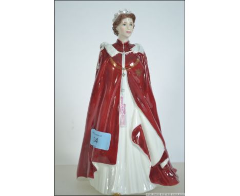 A Royal Worcester porcelain figure, In Celebration of the Queen's 80th Birthday 2006, dressed in the robes of The Order of th