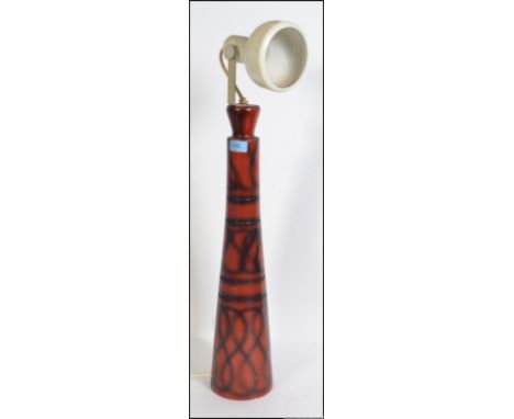 A stunning retro 1970's tall conical wooden  table lamp with a stunning retro swirling design