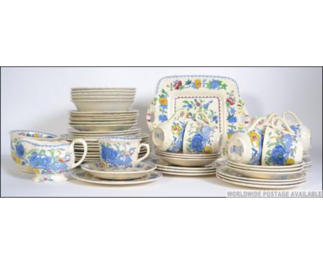 A Masons ironstone Regency and Colonial pattern 57 piece part dinner / tea service consisting of trios, side plates, sandwich