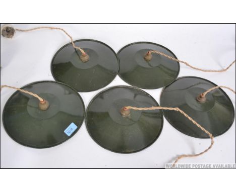 A group of five Military industrial mid 20th century hanging ceiling  light fixtures - chandeliers. Retaining the original gr