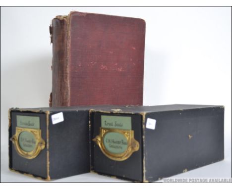 Two boxes of Magic Lantern slides with 50+ slides of Heraldic seals and 25+ slides of royal seals. Both sets are from the C.H