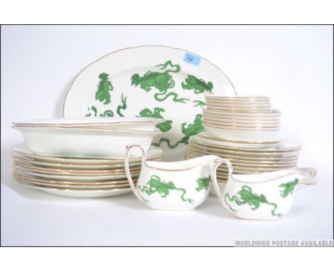 A Wedgwood Chinese Dragons part tea service being stamped to the back to include  dinner plates, platters etc