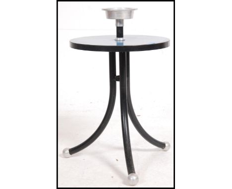A retro / vintage mid 20th century Resistoid atomic ashtray / occasional table raised on a tripod tubular base. Measures: 60c