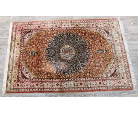 A 20th Century good quality Eastern carpet, 133cm x 207cm.