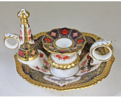 A Royal Crown Derby Old Imari 1128 porcelain chamber stick and candle snuffer, diam. 15cm. CONDITION REPORT - very good, no c